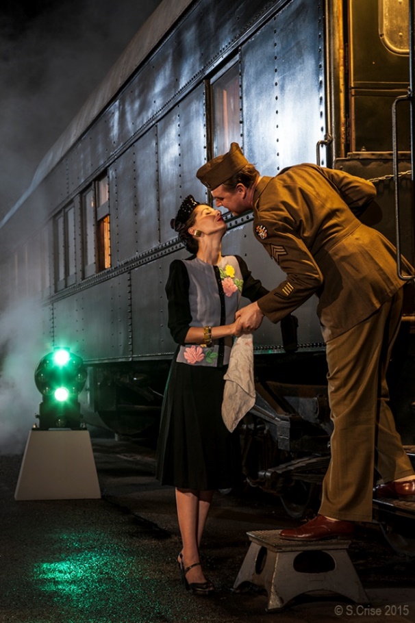 Man And Woman Kissing By A Train